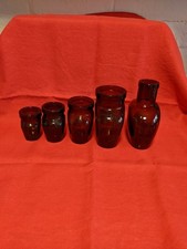 A Collection Of 5 Amber Glass