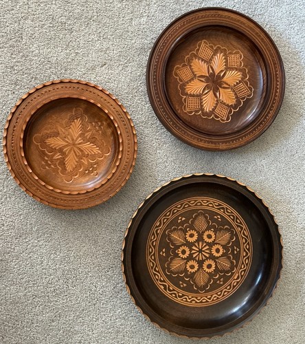 Three carved wooden - carved,