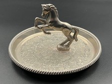 Silver plated leaping horse