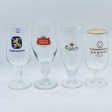 Footed European Beer glass lot x 4 Lowenbrau Stella Artois Carlsberg Schwechater