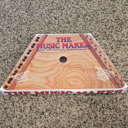 The music maker lap - lap, harp