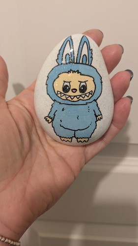 Hand painted pebble a - hand,