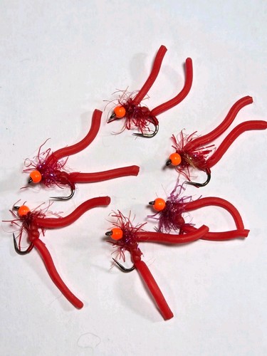 Red squirmy worms fly - red,