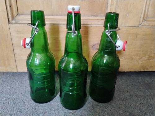 Three grolsch green glass - three,