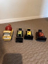 Four Tonka Toys. 1 Cement Mixer, I Digger And 2 Dozers. Unboxed.