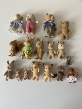 17 sylvanian families assorted figures.