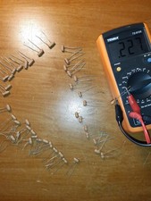 Job lot dog bones capacitors 100, 150 & 200pF