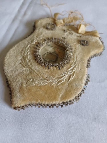 Antique velvet beaded shield
