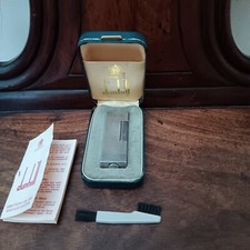 Dunhill Roller gas lighter with original case and instructions. Working order
