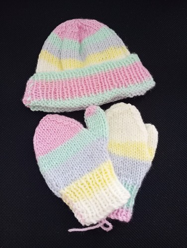 Hand knitted baby rainbow - hand,