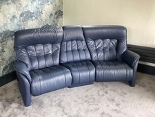 Himolla Curved Settee, Blue leather, Full Electric Reclining, Drop Down Table.