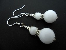 A PAIR OF DANGLY WHITE JADE