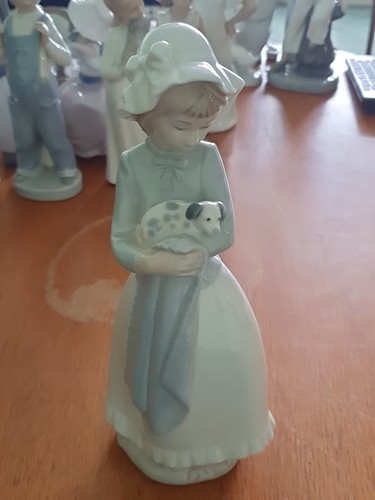 Nao lladro figurine - by,