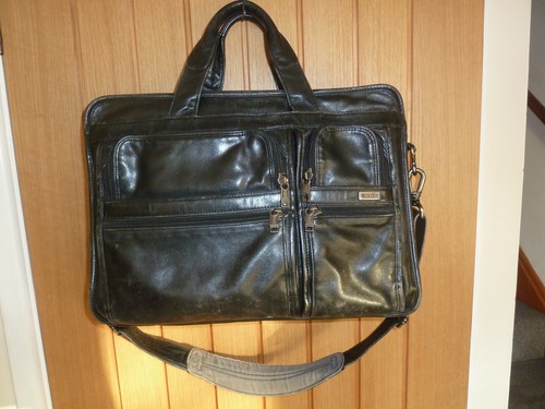 Tumi black leather - tumi,