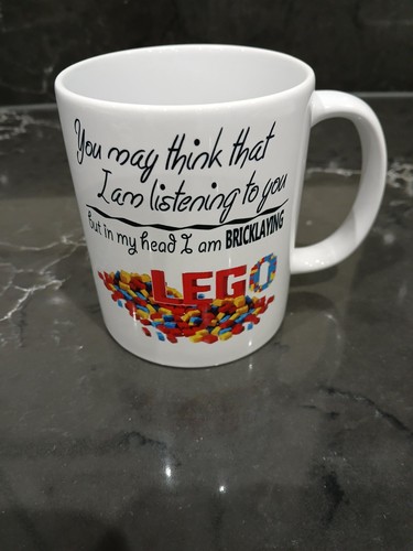 Lego bricklaying ceramic mug