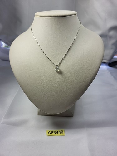Divided gold and - clear, gem