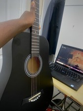 Black acoustic guitar 18frets