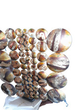 A Large Piece Of Wall Art With Circles Depicting The Craters Of The Moon