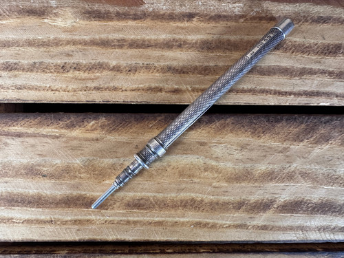Antique mechanical silver