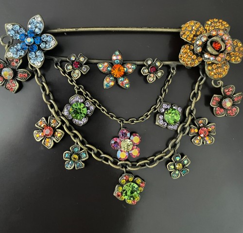 Butler and wilson brooch - and,