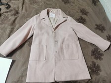 The coat for a girl of 8 years