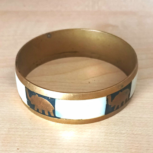 Gold tone metal bangle - tone,