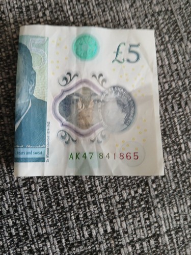 Pound note with on the - pound,