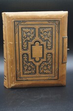 A LOVELY ANTIQUE VICTORIAN FAMILY LEATHER BOUND ALBUM WITH SOME PHOTO'S.