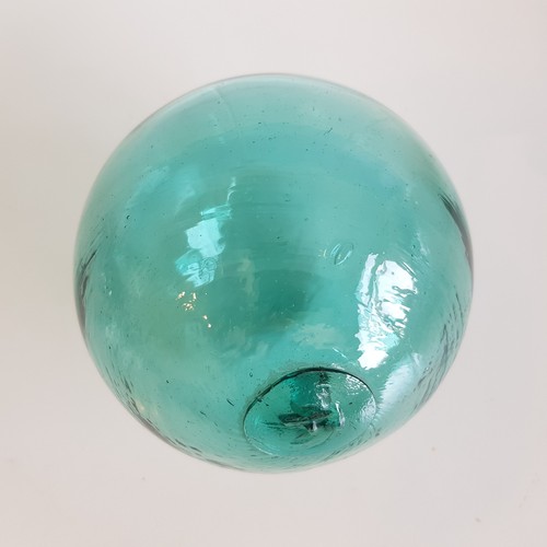 Antique glass float sea
