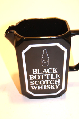 Black bottle scotch whisky - black,