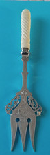 STUNNING ORNATE PIERCED CHASED VICTORIAN BONE HANDLED SILVER PLATED BREAD FORK.