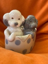 Nao by Lladro, two puppies in