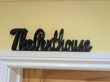 The Penthouse Door Sign