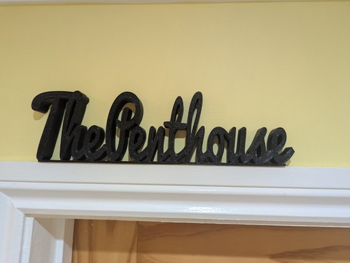 The penthouse door sign - door,
