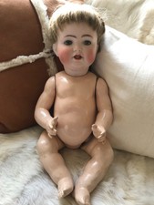 Antique, early 20th century baby doll, bisque head by Simon and Halbig Germany