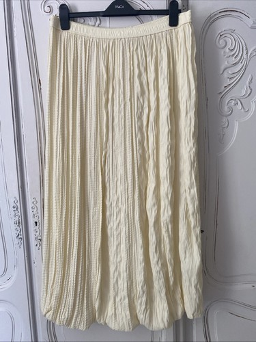 New s cream - £45, pleated