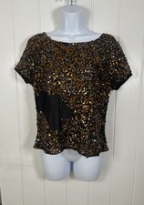 Woman’s sequin top size 14