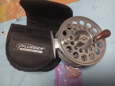 PFLUEGER TRION  4  1/8"  2858  FLY TROUT/SALMON/PIKE REEL. EXCELLENT WORKING CON