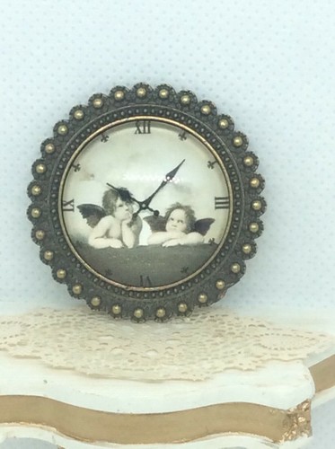 Dolls house cherub clock