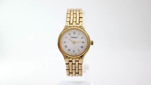 Tissot v232 gold tone quartz - tissot,