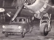 MOSKVICH L.H.D. FOUR DOOR SALOON, UNDERNEATH PLANE WING PHOTOGRAPH.