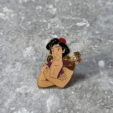 DISNEY ALADDING PIN BADGE ALADDIN WITH ABU SAT ON HIS SHOULDER.