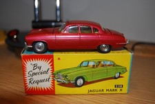 Corgi 238 Jaguar Mark X in original box. Rare Cerisse Metallic. 1963. Near mint.