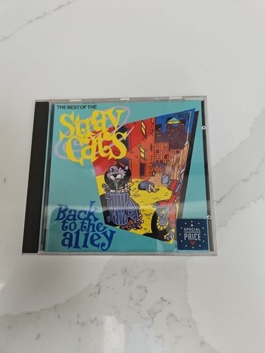 Stray cats back - -, alley