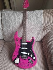 Jaxville Rock chick Electric guitar pink  with amp.