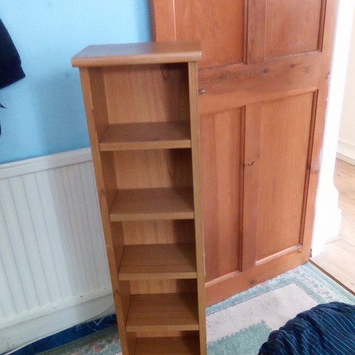Brown wooden narrow bookcase - narrow,