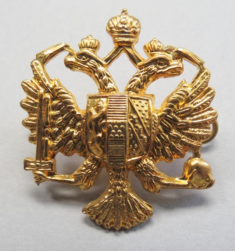 Military brass badge 1st - brass,