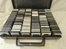 Vintage plastic photographic slide carrier case with 600 35mm colour slides