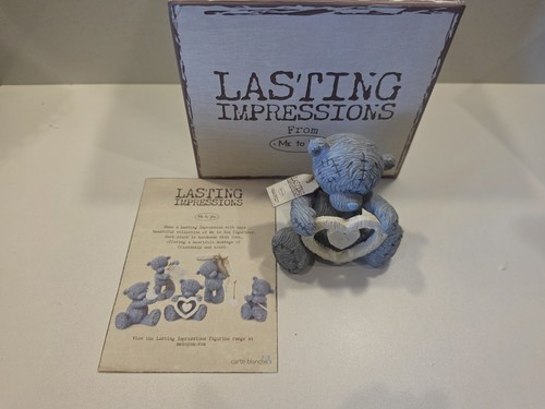 You bear figurine - to,