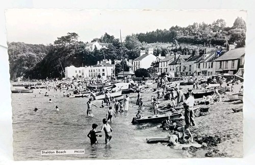 Children paddling boats - by,
